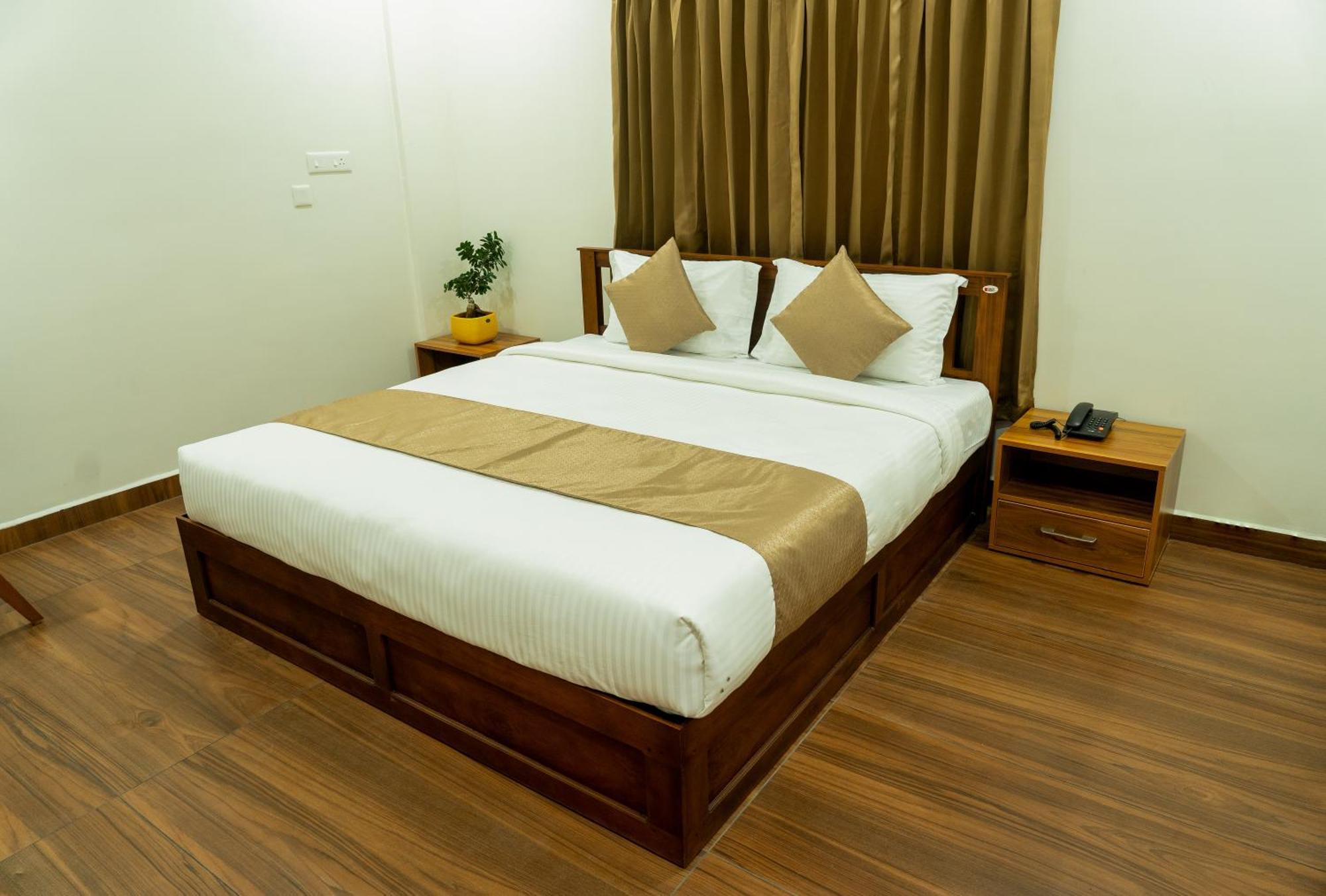 Fly View Airport Residency Hotel Nedumbassery Buitenkant foto